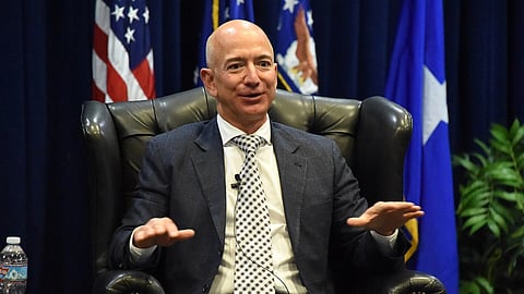 Jeff Bezos in a chair