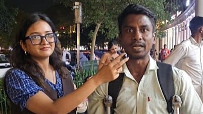 In this image, a content creator is asking question on gender equality to a street vendor and his answer is winning hearts.