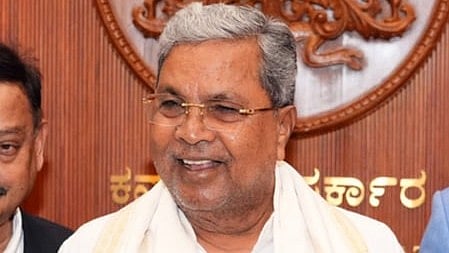 Karnataka Chief Minister Siddaramaiah in a office