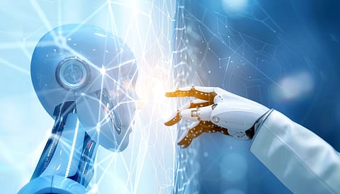 A humanoid robot and a robotic hand reach towards each other, separated by a glowing digital interface. The scene conveys a sense of technological connection.