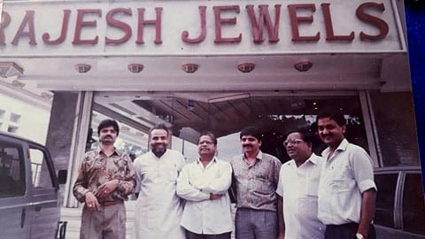 Rajesh Mehta and PM Narendra Modi pose together at Rajesh Jewels, highlighting a significant event.