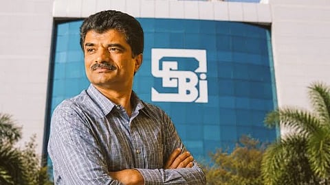 Rajesh Mehta Standing in front of SEBI Building
