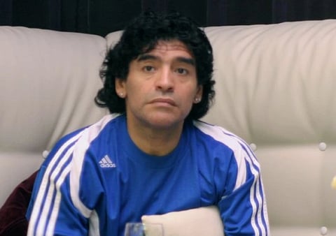 Image of Diego Maradona watching the Germany-Sweden quarterfinal match of the 2006 FIFA World Cup on television. Leipzig, Germany, June 2006.
