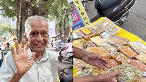 Elderly Mumbai street vendor Mansukh Kaka arranging packets of homemade snacks at his roadside stall