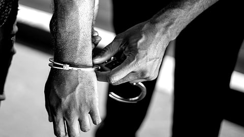 Man hands arrested 