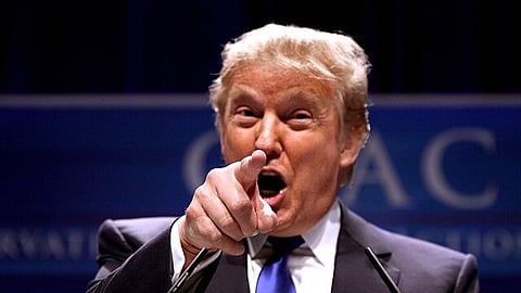 US President Donald Trump speaking at an event as polling shows voter dissatisfaction over the Iran war