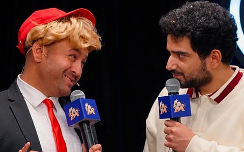 Image of a man impersonating to be Donald Trump (left) and Samay Raina (right). Both have a mic on their hands with India's Got Latent logo on the mic. 