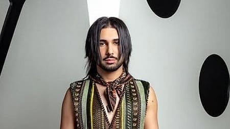 In the image Orry is shown modeling with long hair
