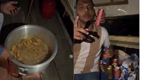 The video shows people eating a chicken iryani on a boat in the middle of the Ganges at Varanasi's Dashashwamedh Ghat. 