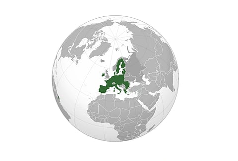 Map of the world highlighting Europe in green. The globe is mostly gray, emphasizing Europe at the center, conveying a focus on that region.