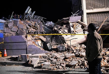 In the image a demolished building is shown from venezuella