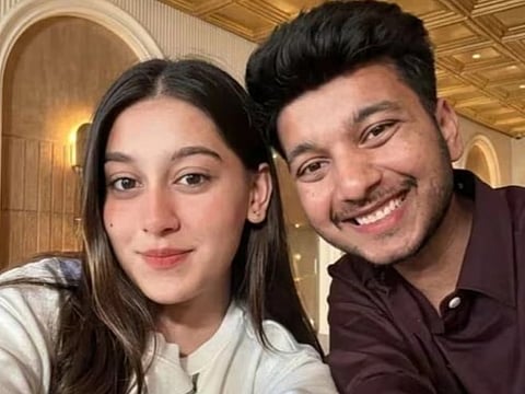 Image of Siya Goyal and Ketan Agarwal smiling and posing for a selfie. 
