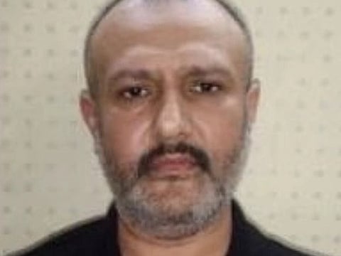 Image of fayyaz Premji who was arrested for allegedly distributing poisonous pills during Muharram procession. In the image he is wearing black shirt. 