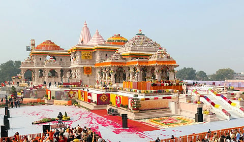 The image is of Pran Pratishtha ceremony of Shree Ram Janmaboomi Temple in Ayodhya, Uttar Pradesh on January 22, 2024. In the image a huge crowd can be seen in front of the temple which is decorated for a religious ceremony.
