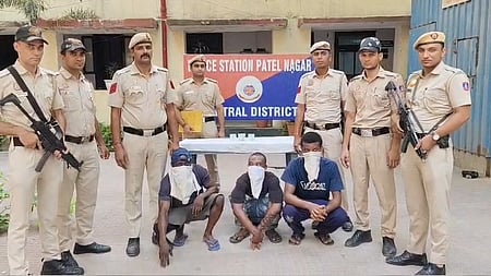 In the image Delhi Police officers are shown in Patel Nagar police station