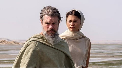 Matt Damon and Zendaya standing.
