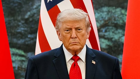 US President Donald Trump addressing supporters during a political event amid debate over the 2026 midterm elections.