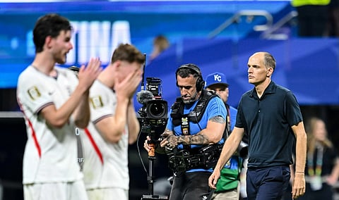 Thomas Tuchel, Declan Rice and Elliot Anderson looking sad