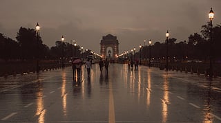 In the image the Monsoon season of Delhi is shown with the view of India Gate