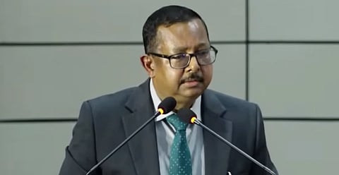 In the image Justice Ujjal Bhuyan is shown addressing the university lecture