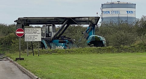 Tata Steel - perway stockyard. in the image at a distance tata steel can be seen written on a tank like building.