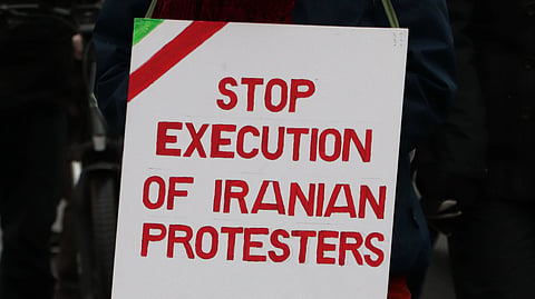 People gather near the site of public executions in Isfahan as the "Do Not Execute" campaign gains support from Iranian writers, artists, and human rights advocates