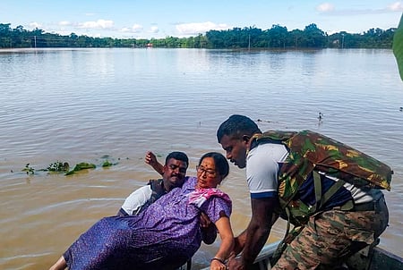 Guwahati: Indian Army personnel assist a stranded woman during flood relief operations under Op Jal Rahat in flood-affected areas of Assam on Wednesday, July 29, 2026. 