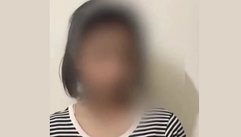 Image of the 15 year old Noida girl who allegedly hurled abuses at PM Modi. in the image she is apologizing to the entire country for her remarks and her face has been blurred. 