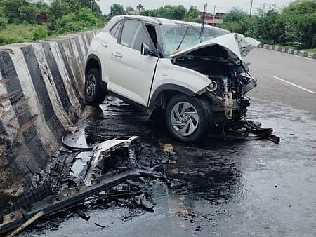Image of a car heavily damaged in a road accident. 