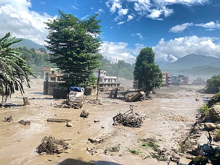 Image from the Nepal Flash Floods with mudslide and debris all over the area.