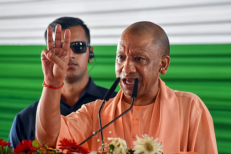 In the image Yogi Adityanath is shown with his bodyguard