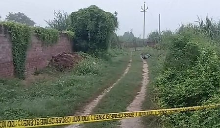Police personnel at the scene of an encounter involving two accused in the Ankit Balyan murder case in Shamli, Uttar Pradesh
