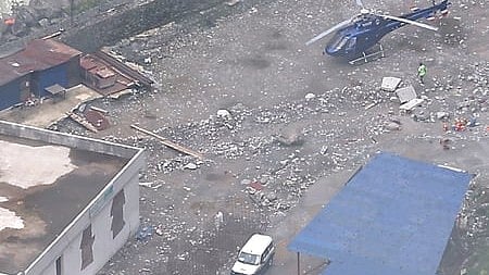Image of a helicopter standing at the site of Nepal flash flood