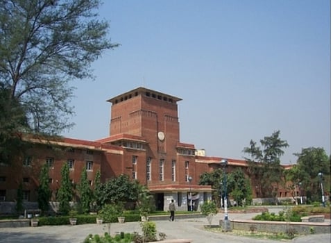 The image shows a brown government standalone building.