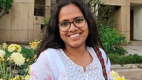 A woman smiling at the camera