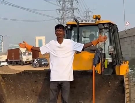 In the image bittu tabahi is standing on JCB in Gurugram where they removed over 2,000 kg of waste as part their cleanliness drive. the image depicts the bittu tabahi river cleanup mission which he intends to take to other states as well 