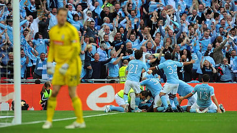 Manchester City celebrating victory, now stands in alleged cheating scandal