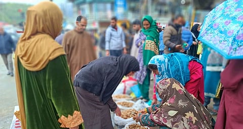 People Buying mushrooms in a Kashmiri market