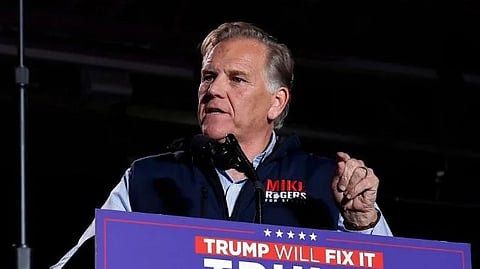In the image Mike Rogers is shown addressing people