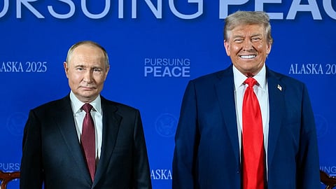Putin and Trump standing in a conference