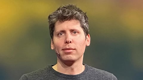 Sam altman speaking at an event.