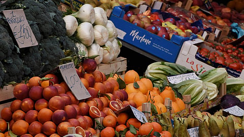 Colorful display of fruits and vegetables at a local market in Catania, Sicily.
