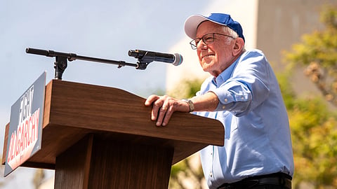 Bernie sanders speaking at the podium