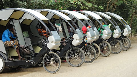 Electric Rickshaws standing in a queue