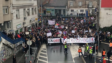 students protesting in the streets of serbia