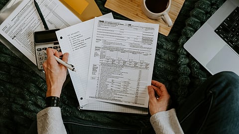 A person making a financial calculations