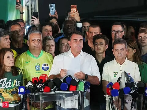 Flavio Bolsonaro with his supporters after his defeat