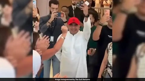 Mohammed Shakaa, at a dubai store with his iPhone collection