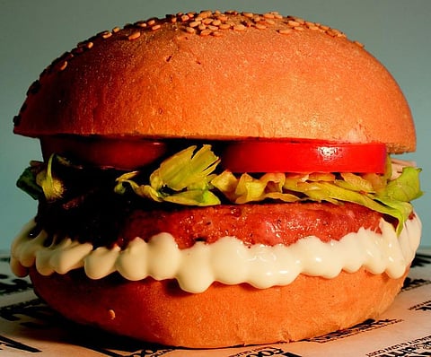 A Veggie Burger which tastes like meat is launched with a motive to convince the meat lovers to Go Green