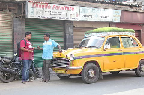 Green Crusader of Kolkata: Meet, Dhananjoy Chakraborty, the cab driver who created a rooftop garden on his taxi